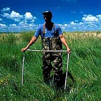 Shawn DeKeyser assessing wetlands in North Dakota