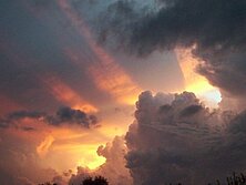 picture of sunset through clouds