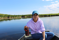 PhD student Kui Hu taking water chemistry sample for NDWRRI research project at prairie pothole wetland P8, North Dakota USA